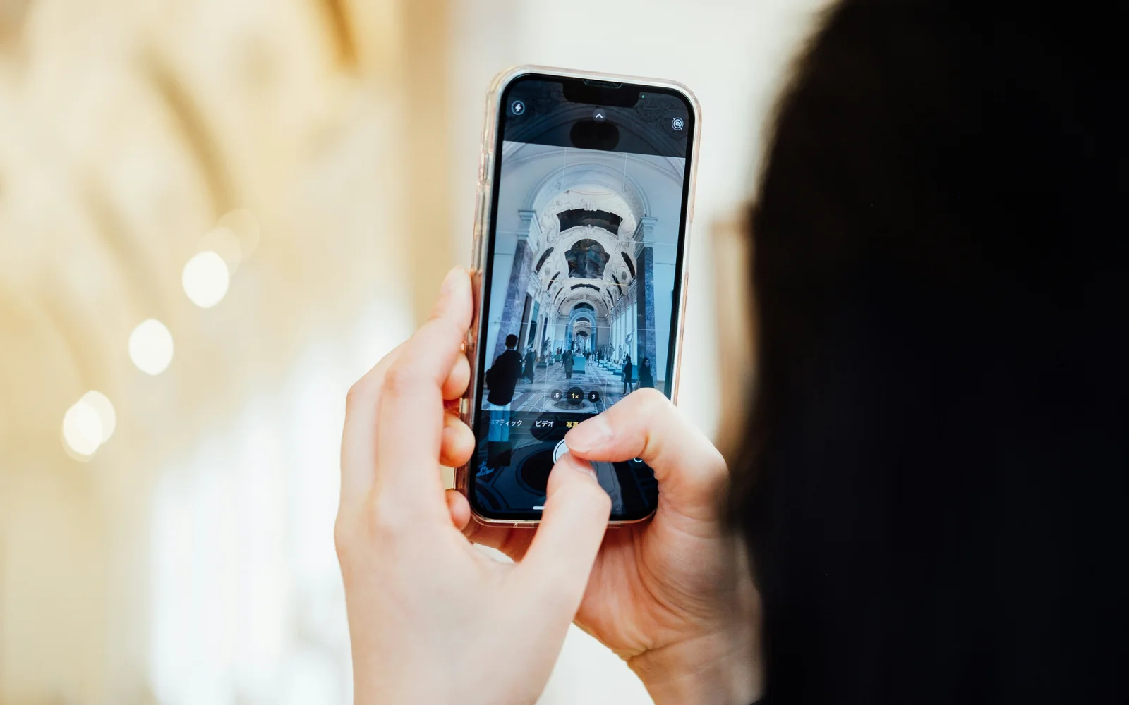Smartphone with a progressive web experience open during a cultural visit.